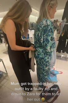 Woman stuck in jumpsuit Zara