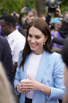 Britain's Kate the Princess of Wale, speaks to members of the public, during a walkabout on the Long Walk near Windsor Castle where the Coronation Concert to celebrate the coronation of King Charles III and Queen Camilla is being held, in Windsor, England, Sunday May 7, 2023. (Andrew Matthews/Pool Photo via AP)