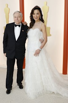 HOLLYWOOD, CALIFORNIA - MARCH 12: (L-R) Jean Todt and Michelle Yeoh attend the 95th Annual Academy Awards on March 12, 2023 in Hollywood, California. (Photo by Mike Coppola/Getty Images)