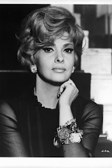 Arlene Golonka sitting in staircase in a scene from the film 'Harvey Middleman, Fireman', 1965. 