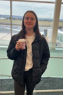 Paris Hedger, pictured at the airport on her way to Melbourne for life-saving surgery.