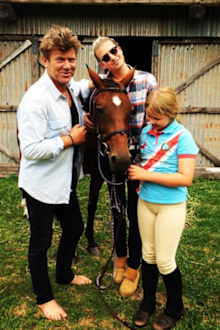 Daughter Estella loves riding horses.
