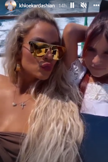 Khloe Kardashian shared footage of herself relaxing with niece, Penelope.