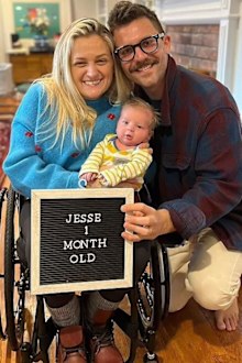Ali Stroker is pictured with her husband and son, Jesse