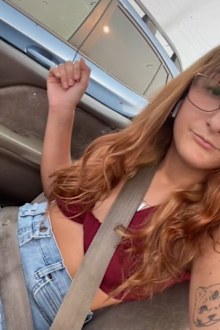 Woman inappropriate outfit mechanic crop top and denim shorts
