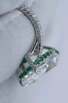 Close up look of hidden emerald halo used in Aryna Sabalenka's ring 