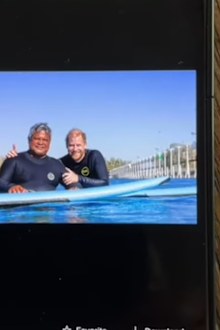 Surfing Instructor Raimana Van Bastolaer and Prince Harry