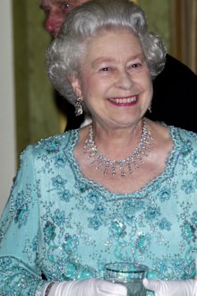 The Queen At The Dorchester Hotel Holding A Glass Before A Dinner Hosted By The President Of Poland During His State Visit To Britain (Photo: May, 2004)