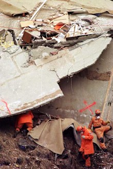 Rescue workers checking debris after the Thredbo landslide.