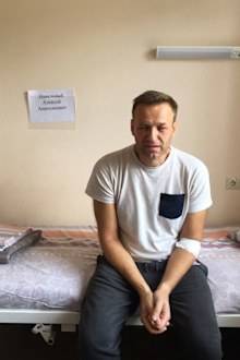This Monday, July 29, 2019 handout photo released by navalny.com shows Alexei Navalny, Russia's most prominent opposition figure, sitting on a bed in a hospital, in Moscow, Russia. Russian opposition leader Alexei Navalny was discharged from a hospital Monday even though his physician raised suspicions of a possible poisoning after he suffered facial swelling and a rash while in jail