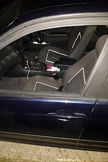 Terrifying moment woman films herself hanging out of speeding car