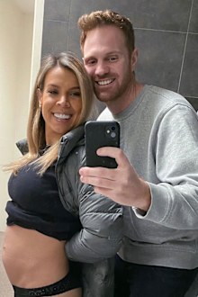 Carly shares a photo of her growing baby bump with boyfriend Neil.