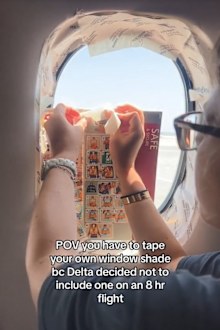 US Traveller says she was made to tape her own window shade on flight. 