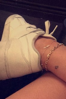 Kylie Jenner, Travis Scott, matching tattoo, ankle, butterfly