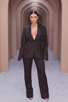 Kim Kardashian in a suit, studying law