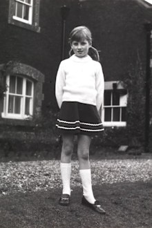 Princess Diana stands outside Park House on the Queen's Sandringham Estate in Norfolk, which is where she was born, in a photo taken by her father