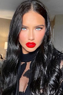Adriana Lima with her hair styled using KYK Hair Care products.