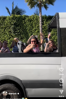 The Rock surprises fans on a tour bus