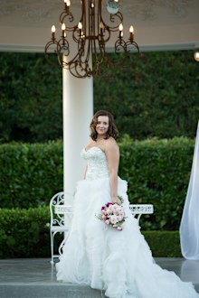 Jess' dress provided by The Sposa Group.