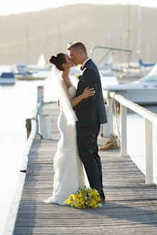 Monica's dress provided by Eternal Bridal.