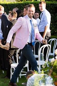 Dave's suit provided by Formal Red.