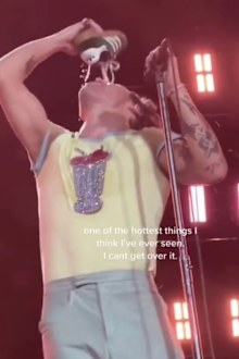 Harry Styles does shoey onstage as he kicks off Aussie tour in Perth.