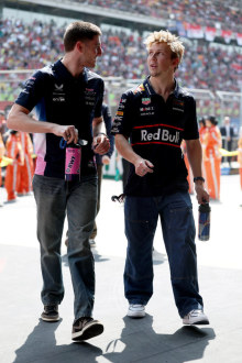 Jack Doohan of Australia and Alpine F1 and Liam Lawson of New Zealand and Oracle Red Bull Racing talk on the drivers parade prior to the F1 Grand Prix of China at Shanghai International Circuit on March 23, 2025 in Shanghai, China. (Photo by Mark Thompson/Getty Images)