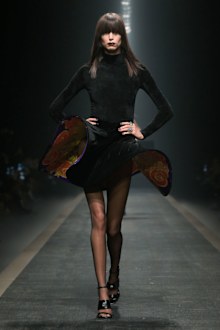 Model on the runway at the Versace Fall RTW 2025 fashion show as part of Milan Fashion Week.