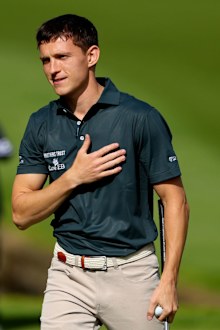VIRGINIA WATER, ENGLAND - SEPTEMBER 18: Tom Holland acknowledges the crowd on the 18th green during the Pro-Am prior to the BMW PGA Championship 2024 at Wentworth Club on September 18, 2024 in Virginia Water, England. (Photo by Andrew Redington/Getty Images)