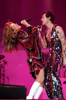 Shania Twain and Harry Styles perform onstage during Coachella
