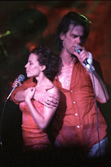 Kylie Minogue performing With Nick Cave And The Bad Seeds in 1996 at Brixton Academy, London.