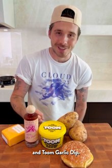 Brooklyn Beckham promotes hot sauce brand, breaking social media silence following David Beckham's Knighthood.