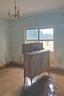 The water rose almost to the eaves of Jenna Breeze's two-storey home in South Lismore.