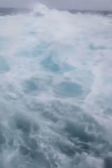 Towering ocean swells Cyclone Alfred
