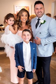 Sooshi Mango Jo with his wife and children