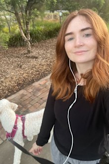 Aine uses wired headphones after losing her AirPods.