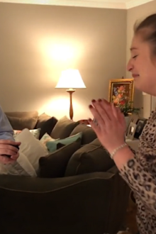 Luck starts crying as soon as she sees the small, square box. Fake proposal.