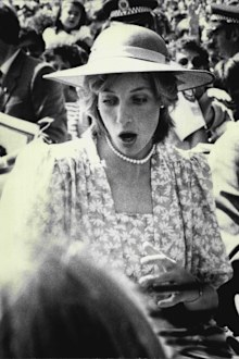 Princess Diana startled when flowers are thrown at her as she leaves the Sydney Opera House.