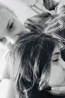 Amie Morris hugging her children following their separation due to coronavirus.