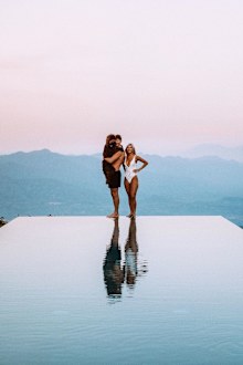 Travel bloggers Jack Morris and Lauren Bullen slammed for bragging about luxurious self-isolation lifestyle.