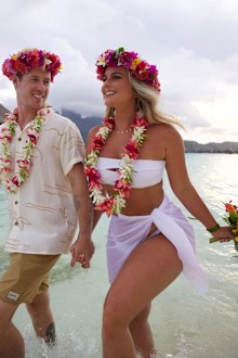 Karina Irby on her wedding day, saying "I do" in a white bikini.