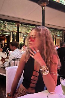 Rita Ora seemingly confirms wedding speculation in an Instagram with wedding band on.