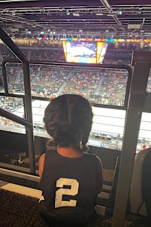 Vanessa Bryant with daughters Bianka and Capri at WNBA game in Las Vegas.