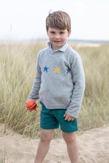 New photos of Prince Louis released on eve of royal's fourth birthday.
