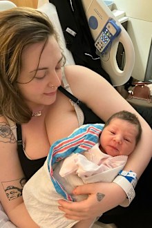 Odele Ventimiglia and her newborn daughter Shiloh in hospital bed.