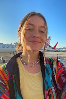 Emma Horn smiles at the camera.