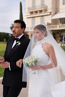 Lionel Richie was emotional as he walked his youngest child down the aisle.