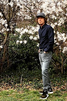 Mick Jagger takes a walk in the park after undergoing surgery.