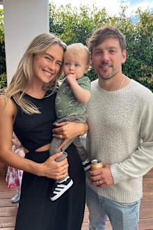 Steph Claire Smith poses with husband Josh Miller and their son Harvey.