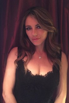 Liz Hurley wears Versace dress